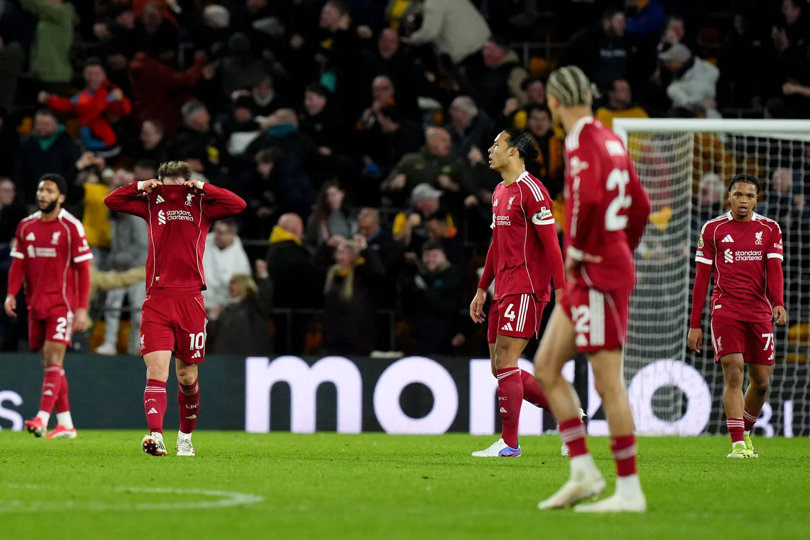 Liverpool players react during the 2-2 draw with Nottingham Forest